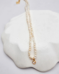 שרשרת פנינים קטנטנות וזירקון לב